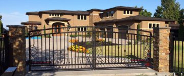 custom driveway swing gate made of steel with decorations